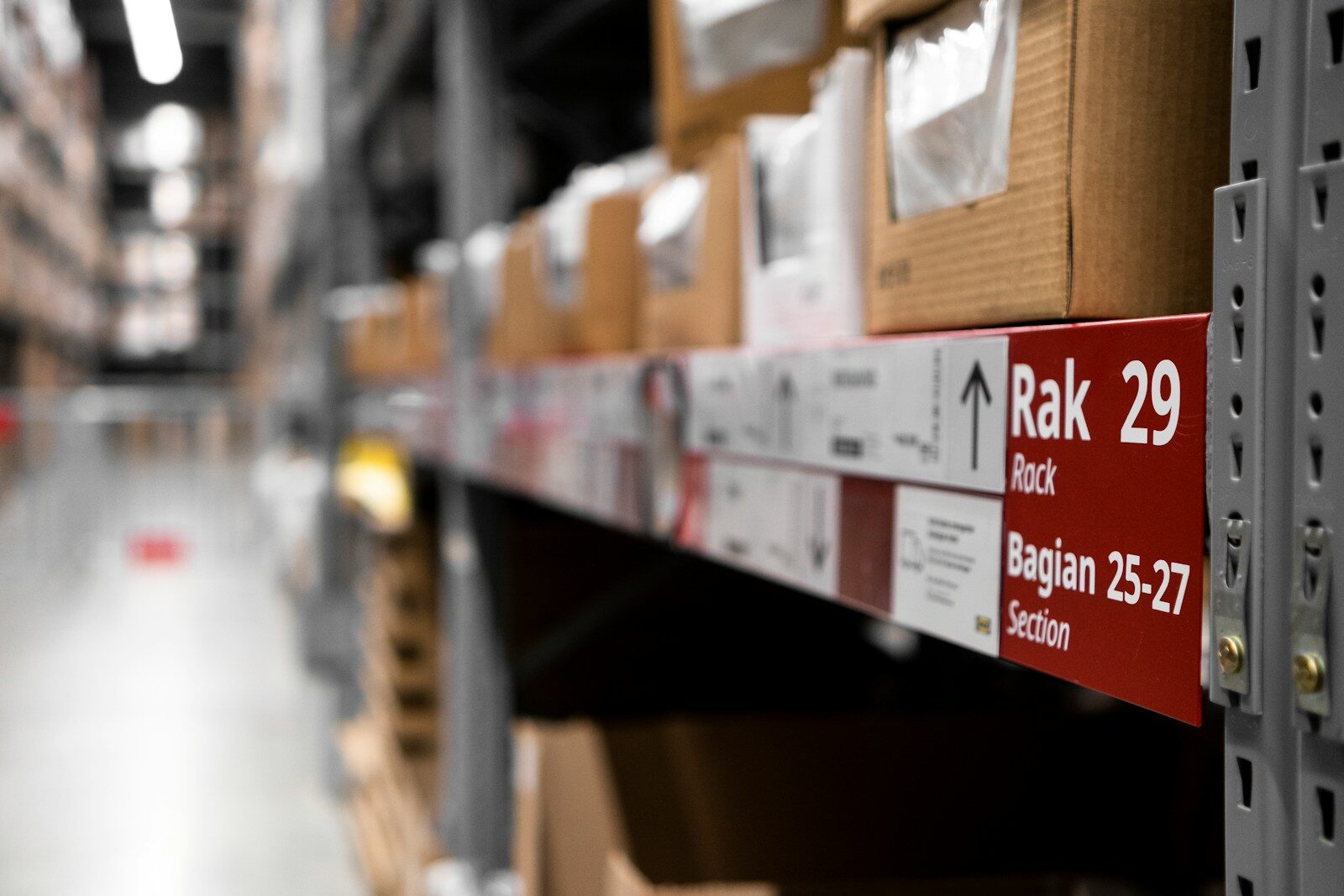 a rack of boxes in a large warehouse